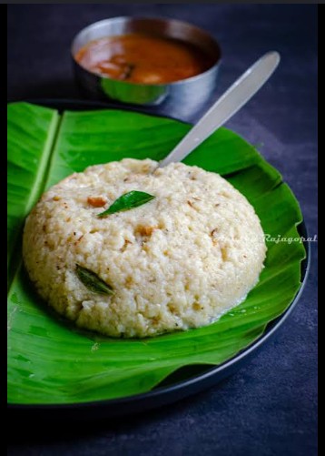 Traditional rich Ghee Pongal cooked with lentils and topped with cashews