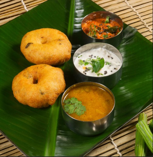 Crispy deep fried Medu Vada served with delicious chutneys